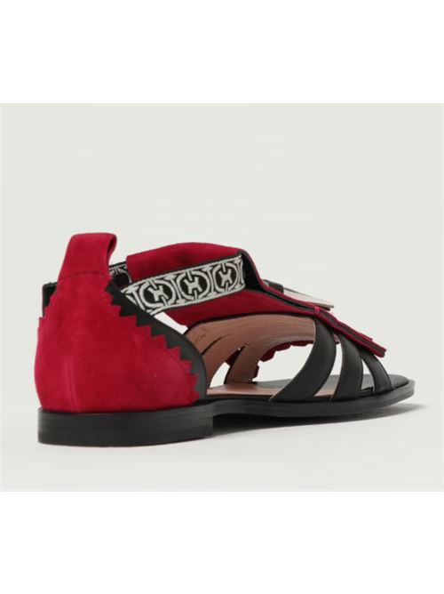 Sandalo flap in pelle cuoio e suede con frangia e nappine Felipa Coccinelle COCCINELLE | E4S05180101-M01